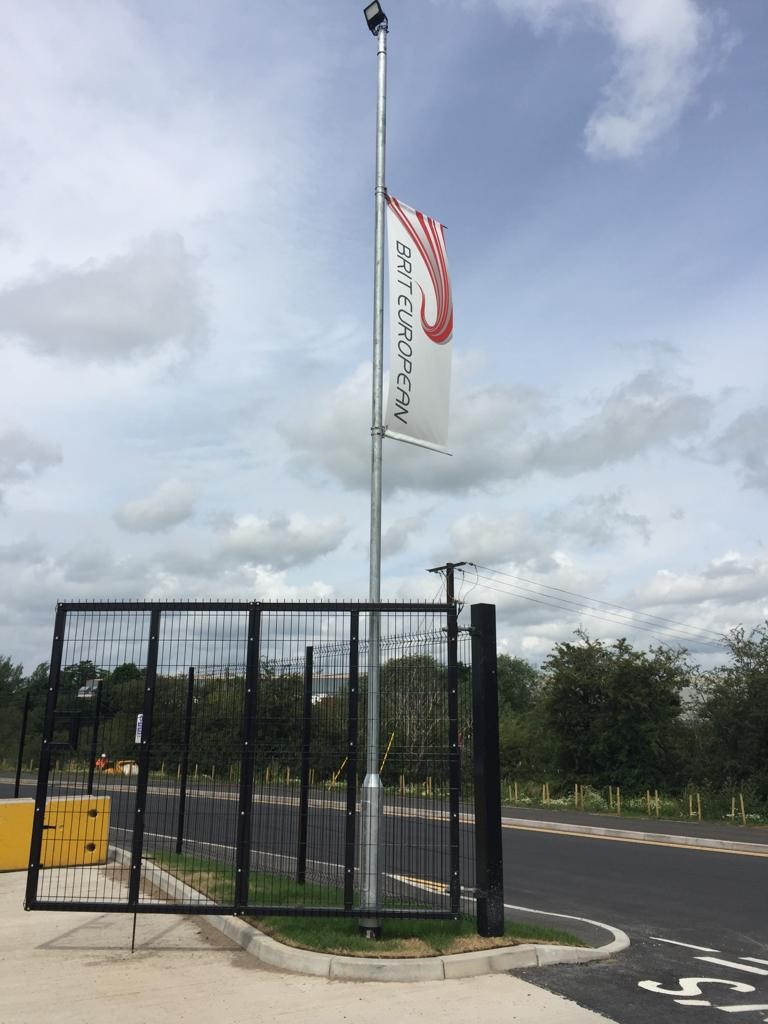 Tall flag showing Brit European company logo