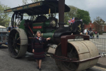 Fiona Bruce MP standing in from of a steam engine