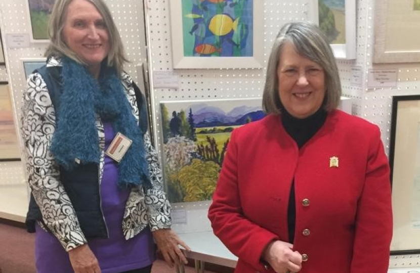 Fiona Bruce MP with artist Brenda Cliff and paintings
