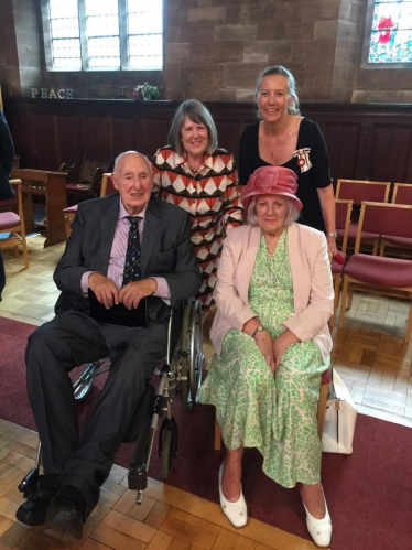 Four people gathered in church at the Civic Service