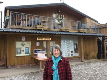 Fiona Bruce MP in front of Bidlea Dairy building