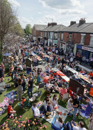 Overhead shot of a street party through Holmes Chapel village centre